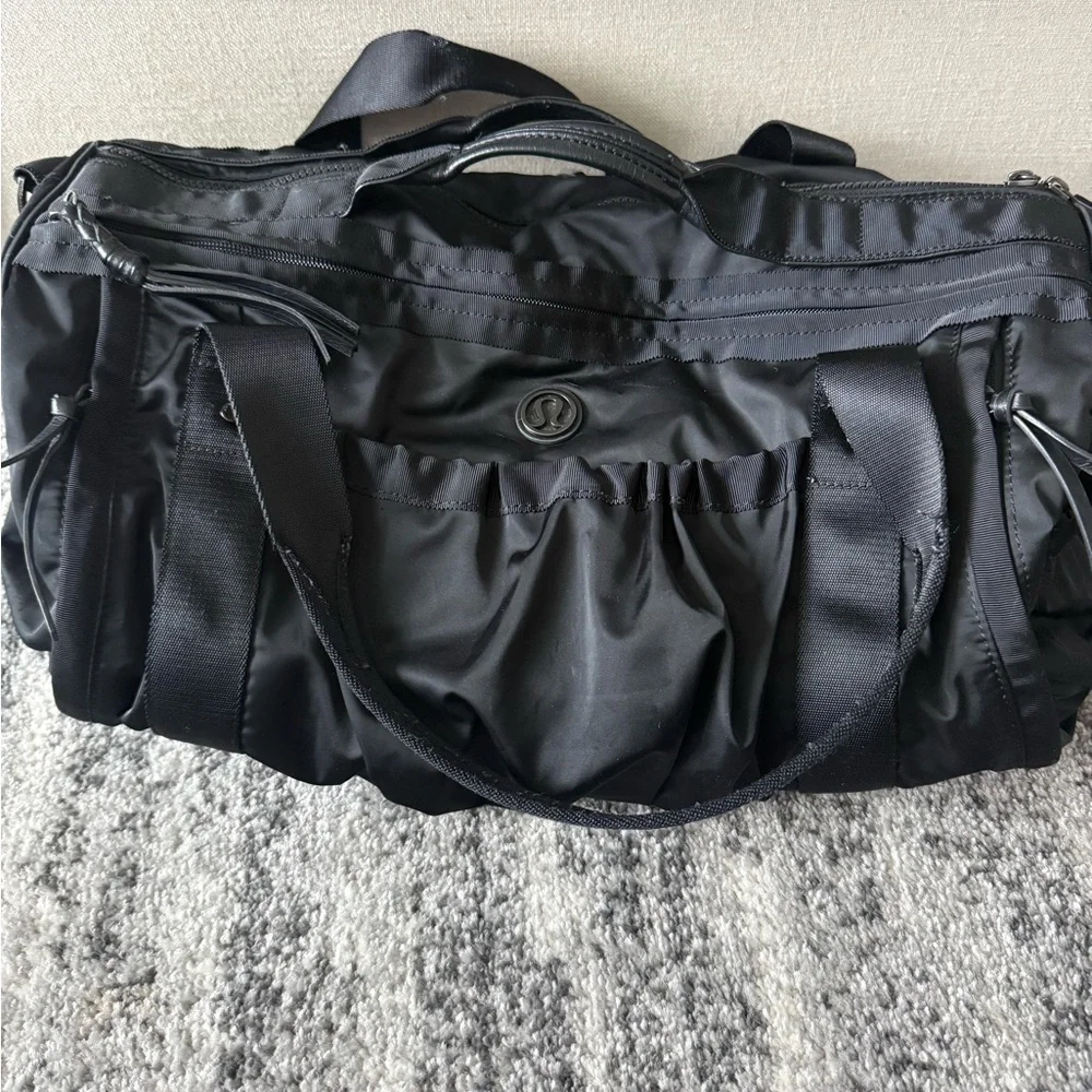 gym bag lululemon Duffle – The Shop at Equinox Canvas Imported Polyester lining Snap closure Measures approx 12 tall measures approx Bag Lululemon Yoga Strap Lululemon